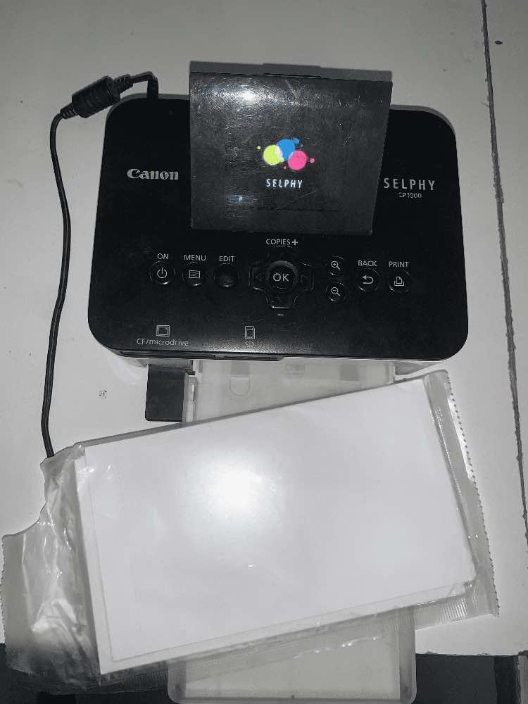 Impressora para fotografia tipo passe SELPHY C1000 da Canon